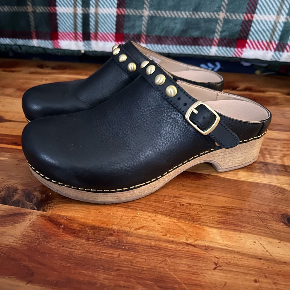 Dansko Black Leather Clogs with Gold Buckle